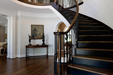 Large elegant staircase photo in Other