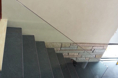 Inspiration for a contemporary staircase remodel in Minneapolis