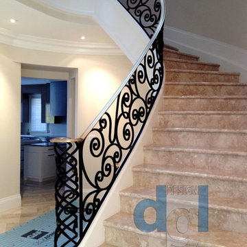 Caribou Rd modern spiral solid brass and wrought iron railing