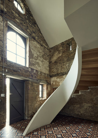 Industrial Staircase by dhbArchitects ltd.