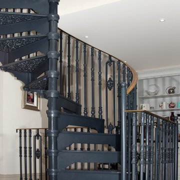 Cast Spiral Staircase with Brass Handrail