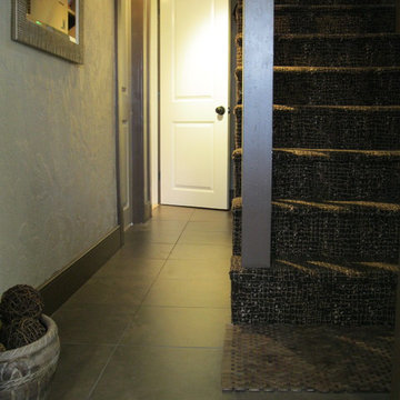Cellar hall with Couristan alligator print wool carpet and custom storage