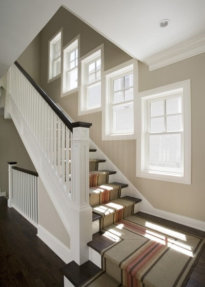 Traditional Staircase by Orren Pickell Building Group