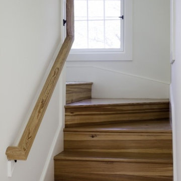 Clean Wrapping Staircase with Built-ins