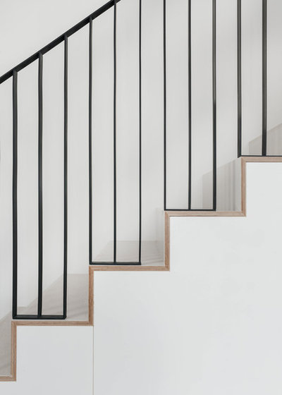 Modern Staircase by McNamara Carpentry Inc.