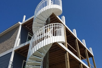 Example of a beach style staircase design in Wilmington