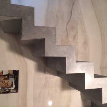 Coloured, polished concrete, stepped soffit stairs