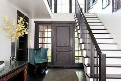 Example of a mid-sized trendy wooden straight wood railing staircase design in Houston with wooden risers