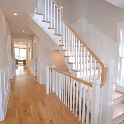 Mid-sized country wooden l-shaped wood railing staircase photo in DC Metro with painted risers