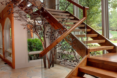 Inspiration for a rustic wooden open staircase remodel in Atlanta