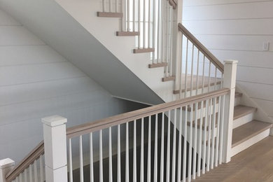 Example of a beach style staircase design in New York