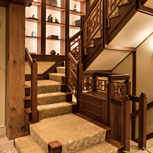 Example of a wooden u-shaped wood railing staircase design in Boston with wooden risers