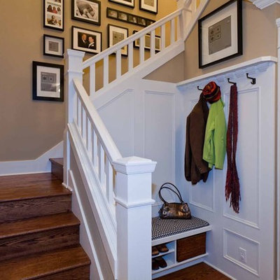 Staircase - mid-sized traditional wooden u-shaped staircase idea in Portland with wooden risers