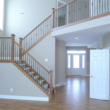 Craftsman stairway with wide painted trim