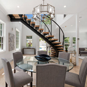 Curved Floating Stairs in Open Concept Home