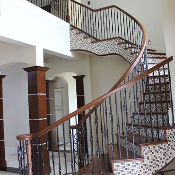 Curved Maple & Iron Staircase With Tile Risers & Stringers