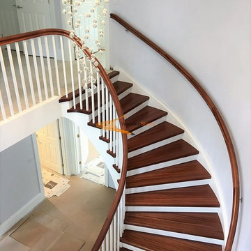 Curved Solid Sapele Mahogany & painted Birch staircase