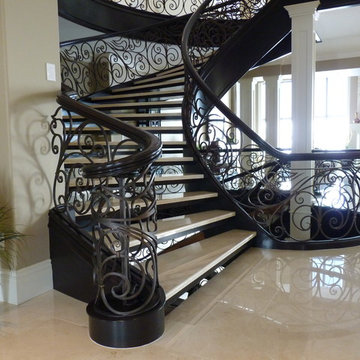 Curved Stair With Metal Pickets