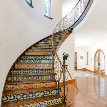 Curved Staircase with Spanish Tile Risers