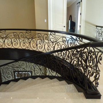 Curved Stairs With Metal Pickets