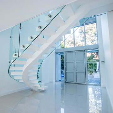 Curved White Middle Spine Staircase