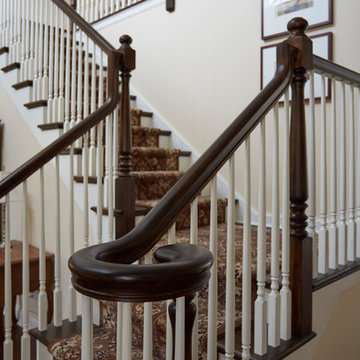 Curved Wood Newel Post with Painted Balusters