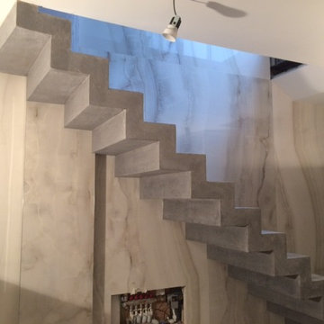 Custom colour matched, polished concrete, stepped soffit stairs