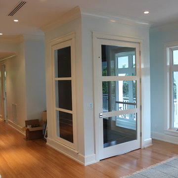 Custom Glassed-In Elevator Shaft, Elevator Car, Trim Work & Ballustrade