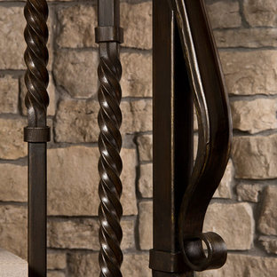 Staircase - large traditional concrete spiral open and metal railing staircase idea in Detroit