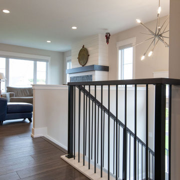Custom Metal Newel Posts and Modern Railing
