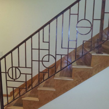 Custom ornamental iron interior stair rail