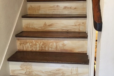 Staircase - small traditional wooden straight staircase idea in New York with painted risers