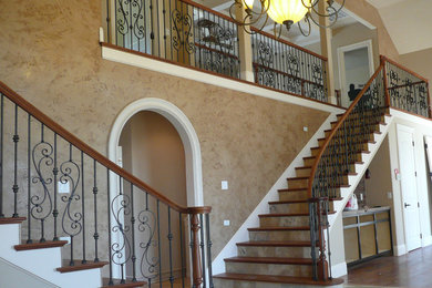 Large elegant wooden straight wood railing staircase photo in Other with tile risers