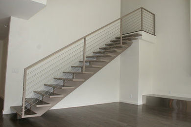 Example of a minimalist open staircase design in Los Angeles