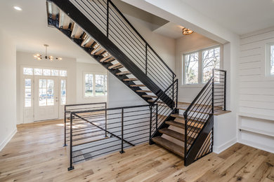 Example of a transitional staircase design in Indianapolis