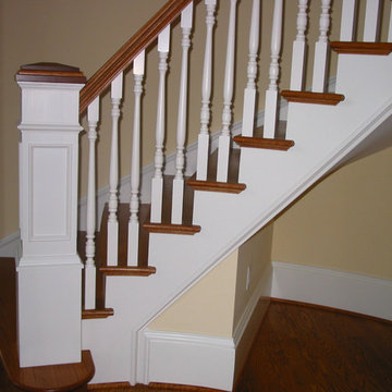 Custom Sweeping Staircase with Wood Spindles