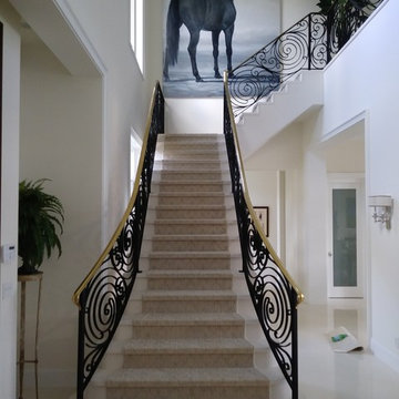 Custom wool stair runner over marble steps.