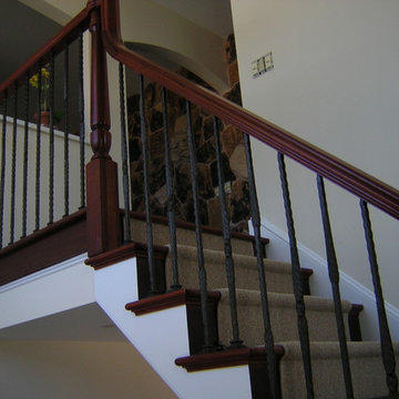 DARK STAIN AND WOOD AND METAL RAILING