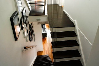 Staircase - contemporary staircase idea in Sydney