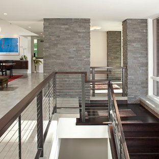 Example of a trendy cable railing staircase design in Minneapolis