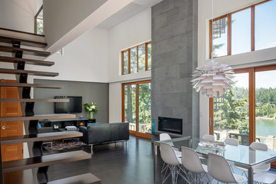 Inspiration for a mid-sized contemporary wooden straight open staircase remodel in Portland