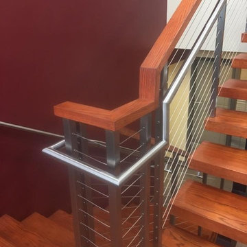 Double steel stringer open risers and cable railing