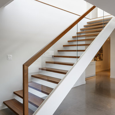 Inspiration for a modern wooden straight open staircase remodel in Ottawa