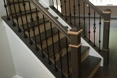 Staircase - mid-sized contemporary wooden l-shaped staircase idea in Chicago with painted risers