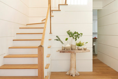 Example of a large beach style staircase design in New York