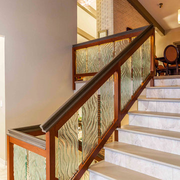 Edge-lit cast glass & quartz stair rail