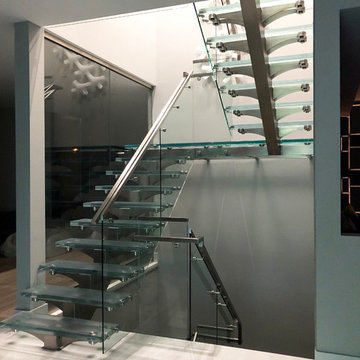 Erica Rd. privet house glass staircase and gallery