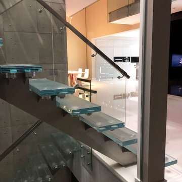 Erica Rd. privet house glass staircase and gallery