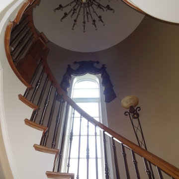 Estate at Lake Jeanette circular stairway