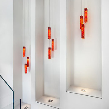 EXOTIC CANDLES contemporary glass staircase lightig fixture by Galilee lighting